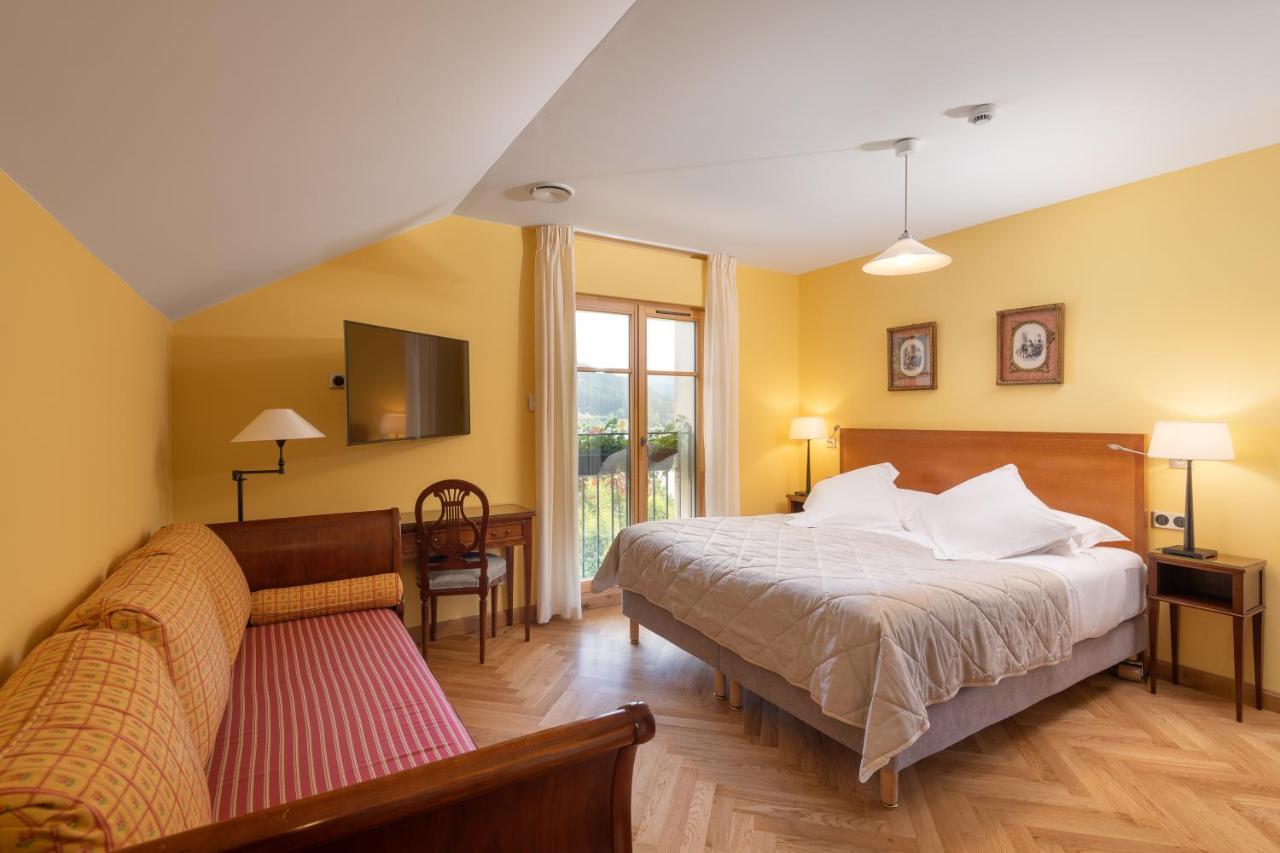 Le Manoir Au Lac Gérardmer Esterno foto